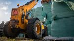 Telehandler with radial block-pattern tires at work