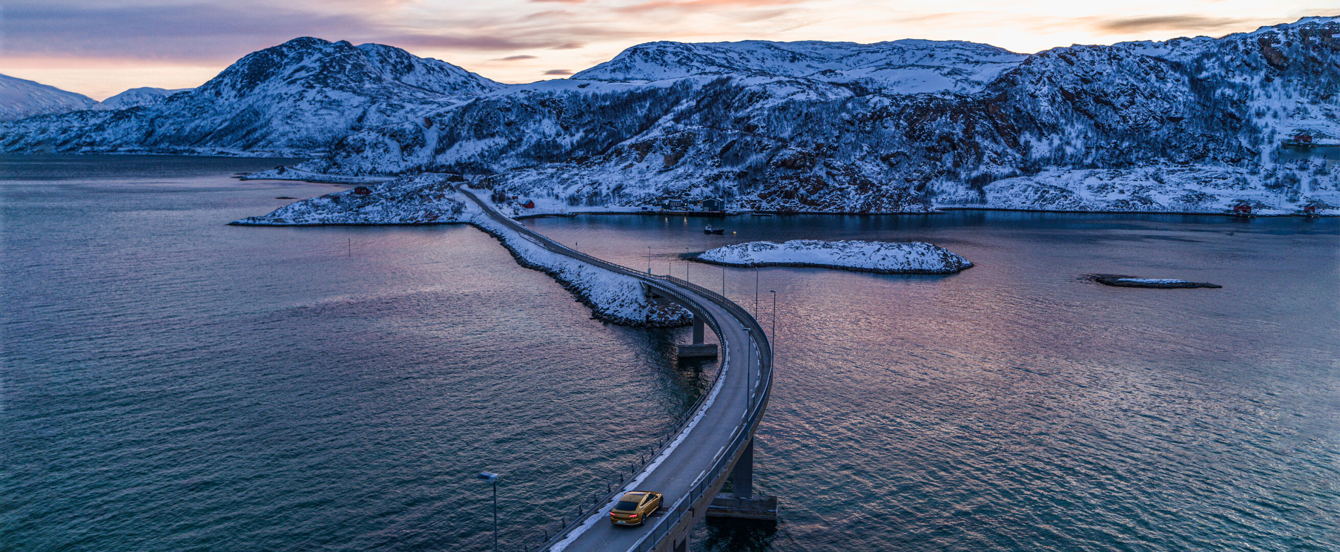 Nordman header with a car in mountain range