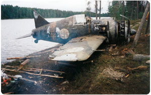 Brewster-372 fighter plane. The Nokian Nopsa pushcart tyre was the tailwheel on the plane being lifted out of the wilderness lake.